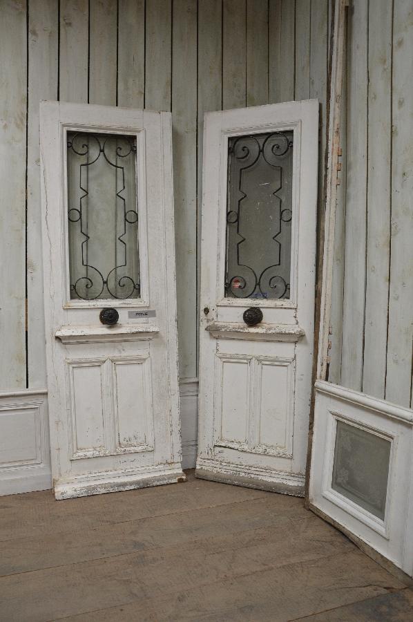 pair of painted entry doors with transom FAE477